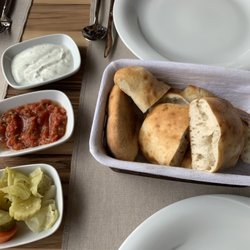 Çavuşin Depe Restaurant - Bread with yogurt dip, tomato dip, pickled vegetables