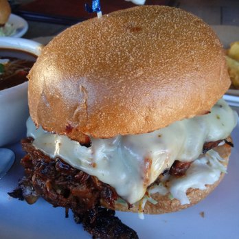 Fronk's - pulled pork Sammy slow roasted Barbecue Pulled Pork topped with melted Monterey Jack Cheese and Cole Slaw. - Burgers Near Me - Bellflower, California