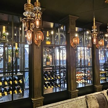 Wolf by Vanderpump at Caesars Republic Scottsdale - Wine rack in dining room - Cocktail Bars Near Me - Scottsdale, Arizona Wolf by Vanderpump at Caesars Republic Scottsdale - Wine rack in dining room - Cocktail Bars Near Me - Scottsdale, Arizona