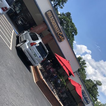 Breadwinner Cafe & Bakery - a small patio full of shade-perfect for a summer meal - Bakeries Near Me - Atlanta, Georgia