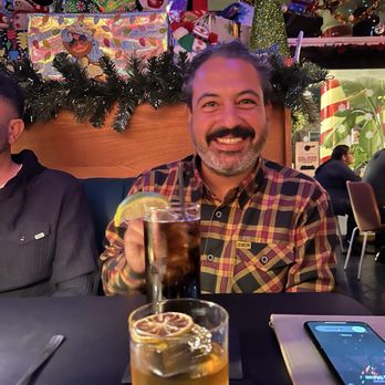 The Overland - My perfect $8 old fashioned photobombed by my boyfriend - Cocktail Bars Near Me - Redlands, California