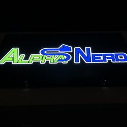 Alpha Nerd - Building Front sign at night