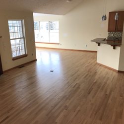 Peter Laki Hardwood Floors - Hardwood floors recently sanded and finished with clear coats of polyurethane.