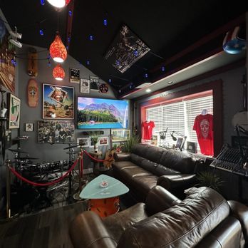 Bravado coffee cafe - Seating area with couches and rock themed decor - Coffee & Tea Near Me - Villas, New Jersey