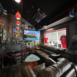 Bravado coffee cafe - Seating area with couches and rock themed decor