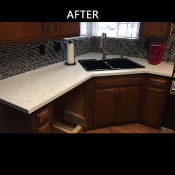 America Construction & Flooring - Kithchen after countertop and backsplash install - General Contractors Near Me