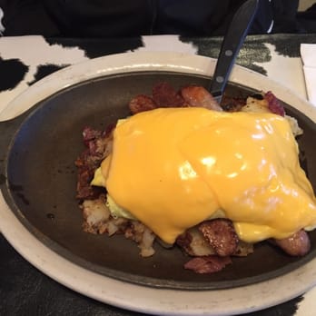Maureen's Kitchen - Skillet Special: Scrambled eggs, sausage, home fries, and American cheese. With English muffin on the side. - Breakfast & Brunch Near Me - Smithtown, New York Maureen's Kitchen - Skillet Special: Scrambled eggs, sausage, home fries, and American cheese. With English muffin on the side. - Breakfast & Brunch Near Me - Smithtown, New York
