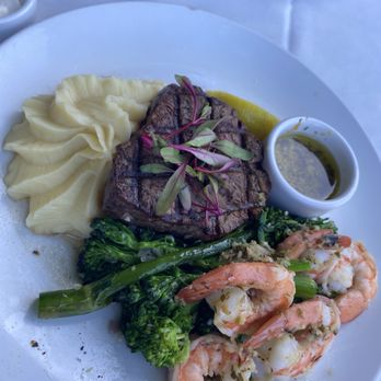 Shadowbrook - Steak, garlic butter prawns, broccolini and garlic mashed potatoes - American Near Me - Capitola, California