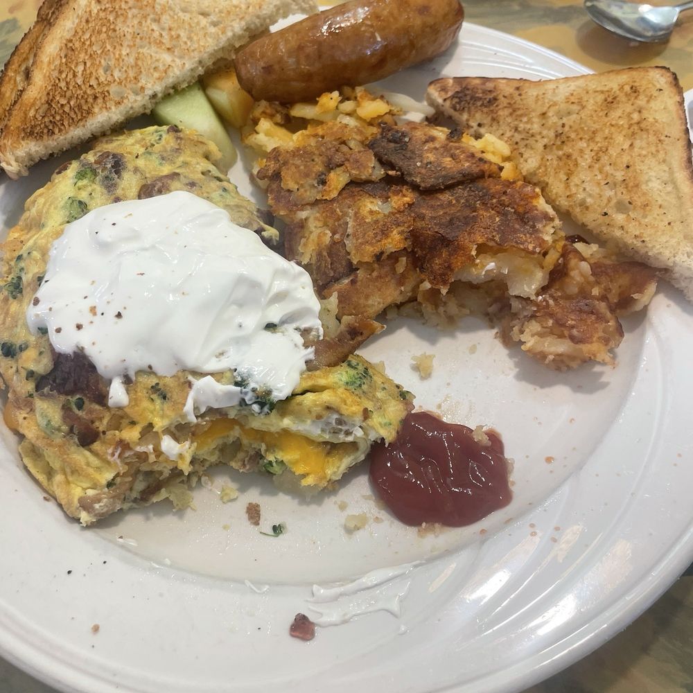 Burnt/soggy toast, burnt potatoes, rubbery burnt omelette. Burnt/soggy toast, burnt potatoes, rubbery burnt omelette.