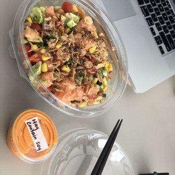 Poke Eats - a bowl of food with chopsticks next to a laptop - Sushi Bars Near Me - Toronto, Ontario Poke Eats - a bowl of food with chopsticks next to a laptop - Sushi Bars Near Me - Toronto, Ontario