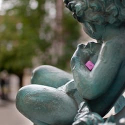 Giddings Plaza - A treasure chest in the baby's arms of the Lombard Lamp.