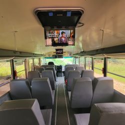 Harmonise Start & Sound - Overhead DVD players on a school bus
