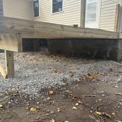 D&G Excavation  - Quick stone job placed underneath a porch in Dorchester
