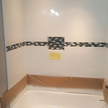 Saving by Reglazing - Basement bathroom after - Refinishing Services Near Me