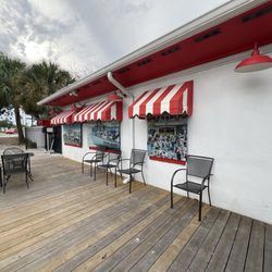 The Boardwalk Italian Ice & Creamery - Outside of local, a boardwalk seating area, pretty chic