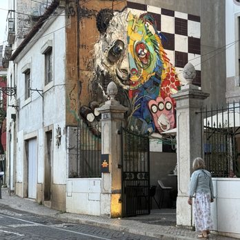 Miradouro das Portas do Sol - Photo 4: Panda bear mural by Bordalo II on Largo de Santa Luzia - Landmarks & Historical Buildings Near Me - Lisbon, 11