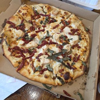 Burattino Brick Oven Pizza - Chicken, basil, sun-dried tomatoes, with a garlic white sauce. - Pizza Near Me - Carson, California Burattino Brick Oven Pizza - Chicken, basil, sun-dried tomatoes, with a garlic white sauce. - Pizza Near Me - Carson, California
