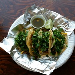 Spicy Mexican Food Dakota Deli - 2 chorizo and 2 carne asada tacos with cilantro, cheese, lime, and salsa
