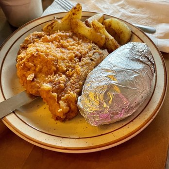 Chesapeake House - Fried Pork Chop with Baked Potato - Seafood Near Me - Myrtle Beach, South Carolina Chesapeake House - Fried Pork Chop with Baked Potato - Seafood Near Me - Myrtle Beach, South Carolina