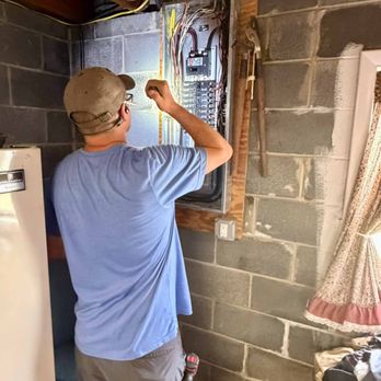 Valueguard Home Inspections - Master Inspector Cory Shalaway inspecting an electrical panel in West Chester, PA. - Home Inspectors Near Me - Philadelphia, Pennsylvania Valueguard Home Inspections - Master Inspector Cory Shalaway inspecting an electrical panel in West Chester, PA. - Home Inspectors Near Me - Philadelphia, Pennsylvania