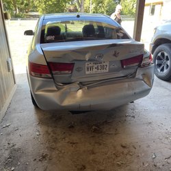 Wallace Collision Center - Damages from F250 rear ending..