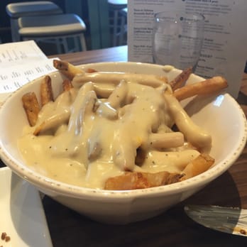 The IRV Bar - Poutine! They use white gravy - Sports Bars Near Me - Irvine, California The IRV Bar - Poutine! They use white gravy - Sports Bars Near Me - Irvine, California