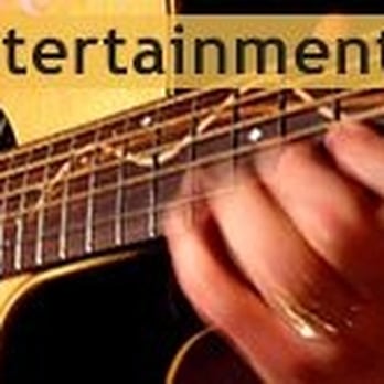 Crusaders Sports Bar - a man playing an acoustic guitar - New American Near Me - Frederick, Maryland Crusaders Sports Bar - a man playing an acoustic guitar - New American Near Me - Frederick, Maryland