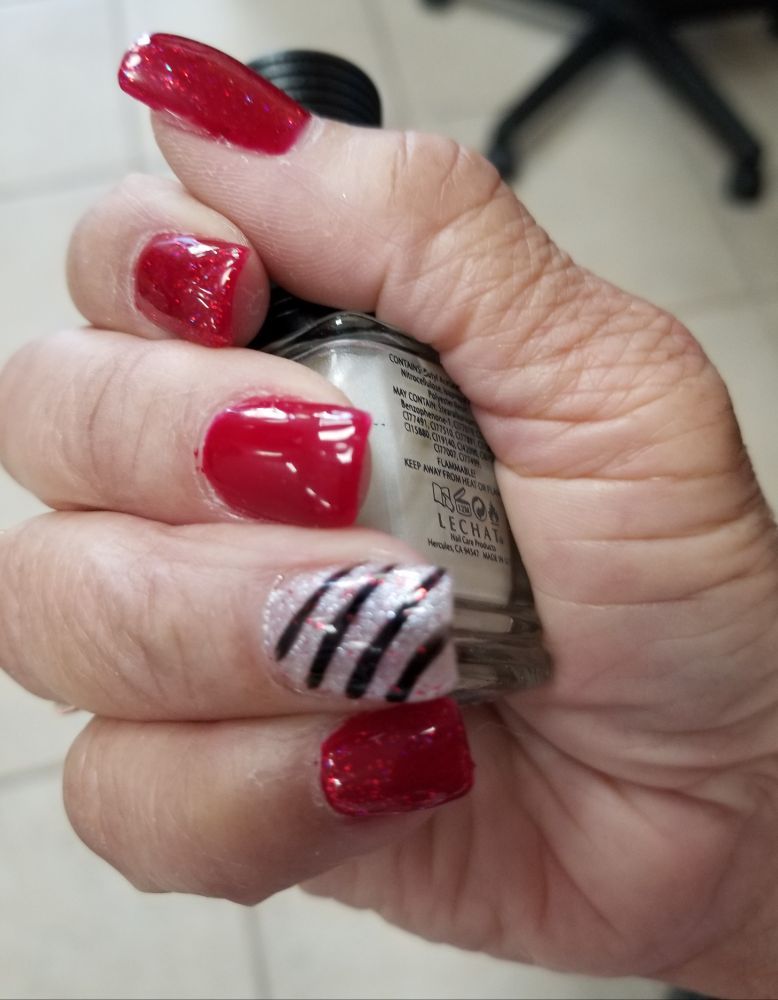 Lucymanipedi Logo
