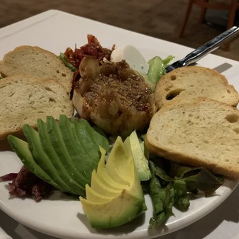 The Earle Restaurant - Roasted garlic. Great flavor but to me, the highlights of the dish are the olive and pepper (?) on the side. Amazing. - Wine Bars Near Me - Ann Arbor, Michigan
