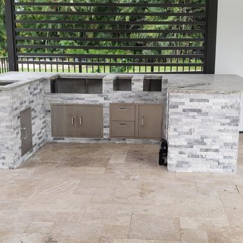 Manny's Remodeling Services - Here the goal was to craft a sleek, modern exterior cabinet, combining a mixture of elegance and durability. - Flooring Near Me