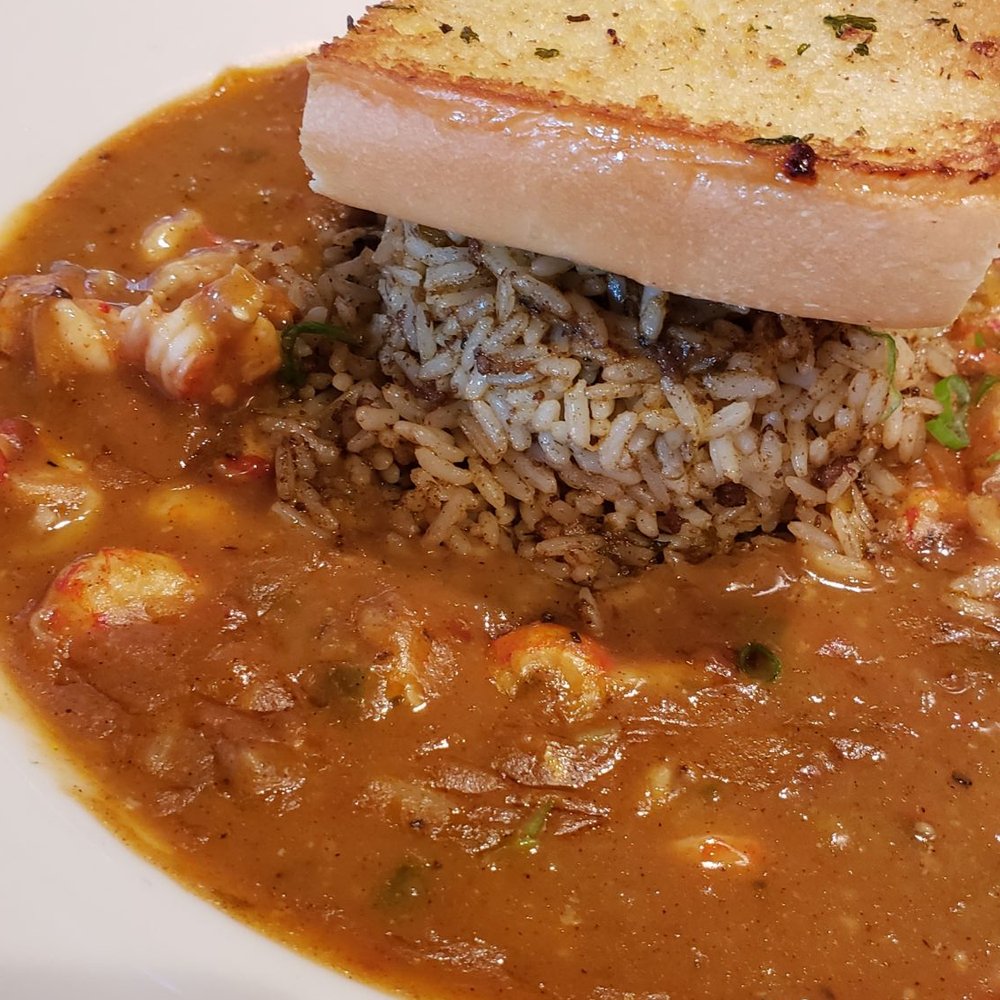 Razzoo's Cajun Cafe - Crawfish etouffet with garlic bread - Cajun/Creole Near Me - Irving, Texas Razzoo's Cajun Cafe - Crawfish etouffet with garlic bread - Cajun/Creole Near Me - Irving, Texas