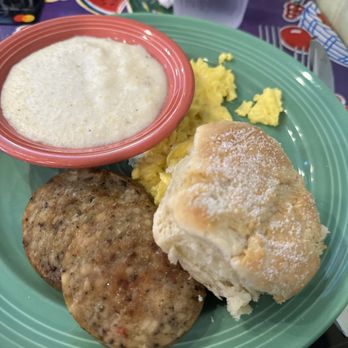 The Flying Biscuit Cafe - Chicken sausage, eggs, grits, and biscuit. - Southern Near Me - Charlotte, North Carolina The Flying Biscuit Cafe - Chicken sausage, eggs, grits, and biscuit. - Southern Near Me - Charlotte, North Carolina