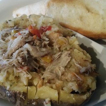 Camile's Restaurant - Seafood stuffed potato - Cajun/Creole Near Me - Erwinville, Louisiana Camile's Restaurant - Seafood stuffed potato - Cajun/Creole Near Me - Erwinville, Louisiana