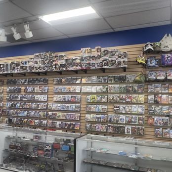 Video Game Geeks - Wide shot of the stores right most game wall and glass cases - Video Game Stores Near Me - Anaheim, California Video Game Geeks - Wide shot of the stores right most game wall and glass cases - Video Game Stores Near Me - Anaheim, California