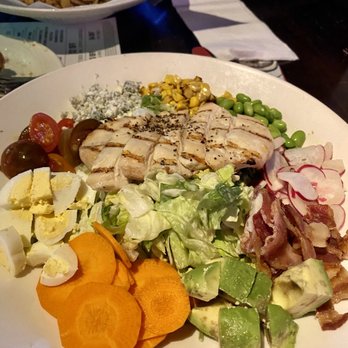 Yard House - Cobb Salad mixed greens, baby tomatoes, edamame, carrots, radish, egg, bleu cheese, corn, bacon, avocado, ranch - Bars Near Me - Moorestown, New Jersey