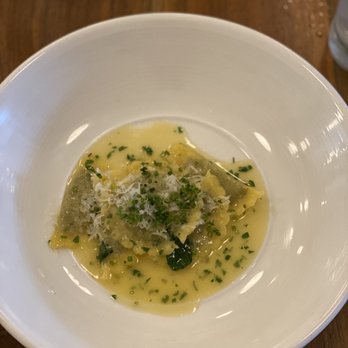 Au Courant - Mezzaluna pasta stuffed with sauerkraut and other things. - Modern European Near Me - Omaha, Nebraska Au Courant - Mezzaluna pasta stuffed with sauerkraut and other things. - Modern European Near Me - Omaha, Nebraska