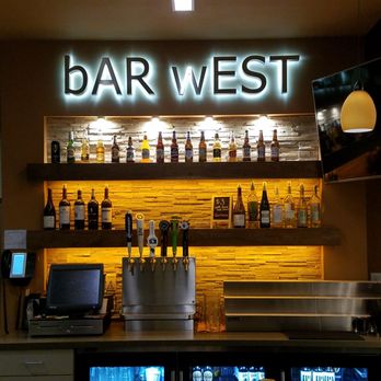 Bar West - a bar with a lot of bottles on the shelves - Bars Near Me - West Allis, Wisconsin