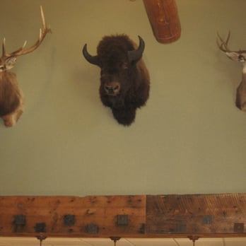 Three Bear Lodge - One wall inside the very interesting Lobby area. - Hotels Near Me - West Yellowstone, Montana Three Bear Lodge - One wall inside the very interesting Lobby area. - Hotels Near Me - West Yellowstone, Montana