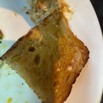 Patagōn - This is sourdough toast with HONEYCOMB BUTTER!   OMG! To die for sooooo GOOD!   They need to sell this butter - Argentine Near Me - Seattle, Washington