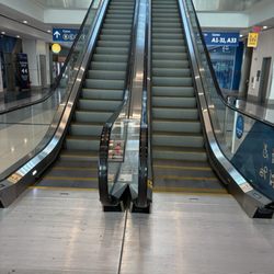 Charlotte Douglas International Airport - Otis NCE Sky Club escalators, Charlotte Douglas International Airport Concourse A