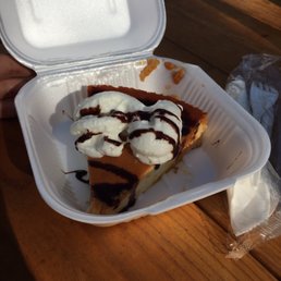 a piece of cake in a styrofoam container