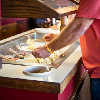 Flapjack's - a man serving food at a buffet - Breakfast & Brunch Near Me - Springdale, Arkansas Flapjack's - a man serving food at a buffet - Breakfast & Brunch Near Me - Springdale, Arkansas