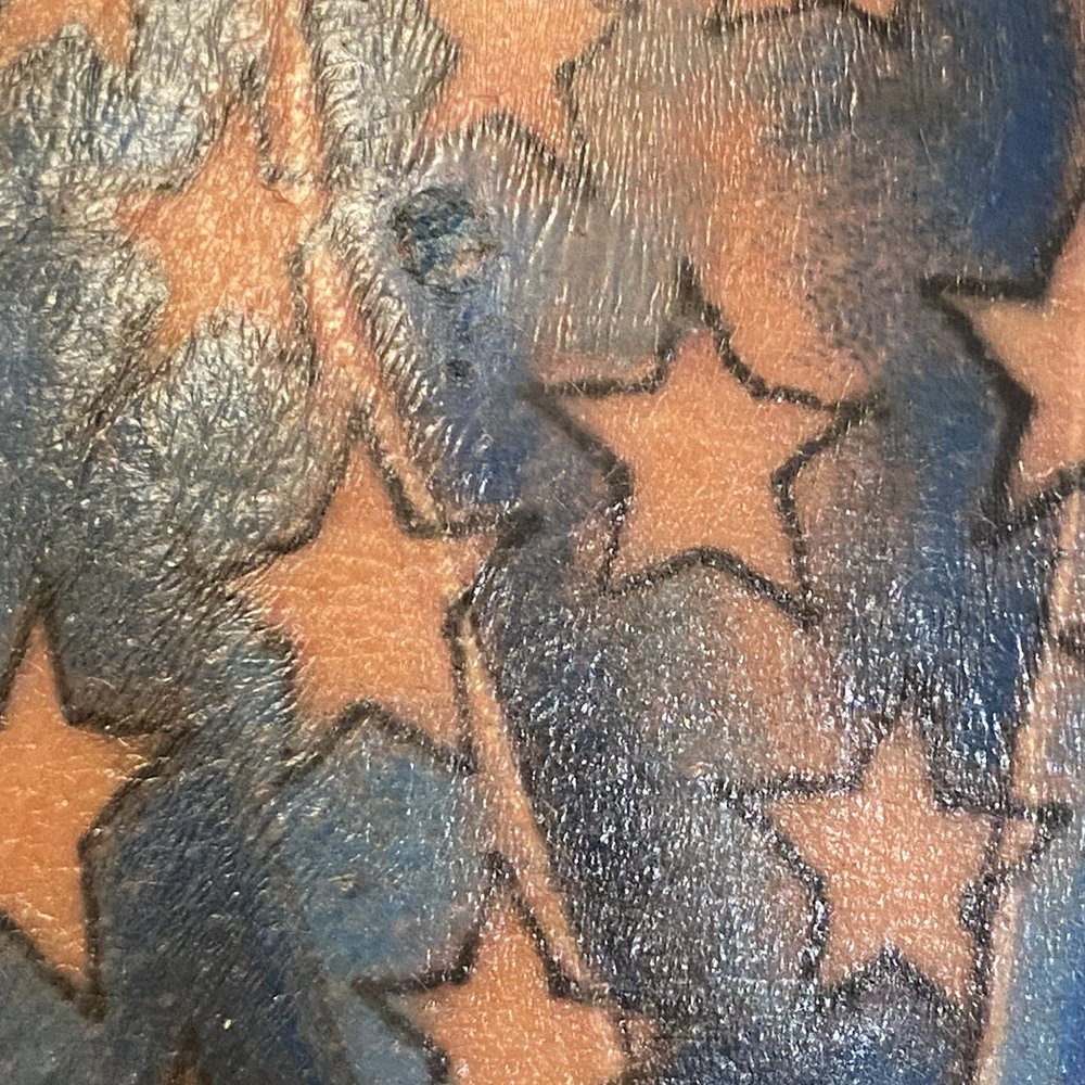 La Familia Tattoo Parlor - The scar left from the money sign. If you notice, it's painted the same blue. But they called me an idiot and threw me out of their shop - Tattoo Near Me - Spring, Texas La Familia Tattoo Parlor - The scar left from the money sign. If you notice, it's painted the same blue. But they called me an idiot and threw me out of their shop - Tattoo Near Me - Spring, Texas
