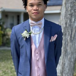 Sandra's Bridal Collection - Sandra helped design his matching attire perfectly.