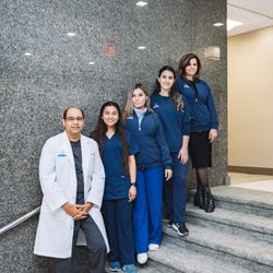 Virginia Oral Surgery Specialists - Vienna - Oral Surgeon Dr. Dawood with dental team.