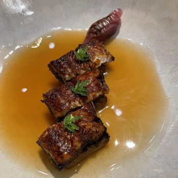 Nisei - Fried unagi over eggplant in unagi bone broth. The unagi tasted as if there was no salt/seasoning...HOW?! - Japanese Near Me - San Francisco, California Nisei - Fried unagi over eggplant in unagi bone broth. The unagi tasted as if there was no salt/seasoning...HOW?! - Japanese Near Me - San Francisco, California