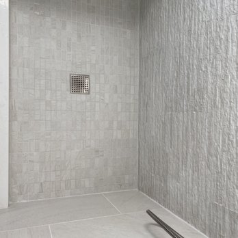 Capstone Tile Works - a shower in a bathroom - Flooring Near Me - Olney, Maryland