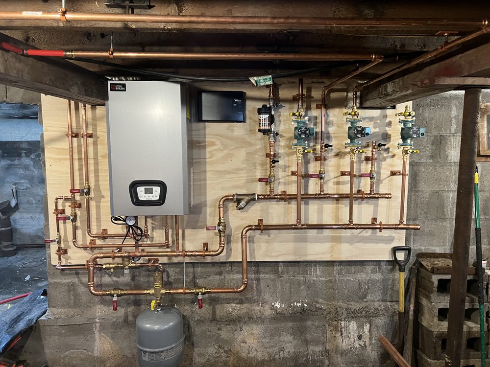 Slide of Wollman Heating and Plumbing