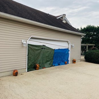 Eastern Shore Overhead Door - Damaged garage door -- now fixed like new by Eastern Shore Overhead Doors in Ridgely, Maryland. - Garage Door Services Near Me - Ridgely, Maryland Eastern Shore Overhead Door - Damaged garage door -- now fixed like new by Eastern Shore Overhead Doors in Ridgely, Maryland. - Garage Door Services Near Me - Ridgely, Maryland