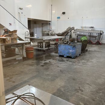 Clausen Oysters - Work Area - You can see this from the inside dining area. - Seafood Near Me - North Bend, Oregon Clausen Oysters - Work Area - You can see this from the inside dining area. - Seafood Near Me - North Bend, Oregon